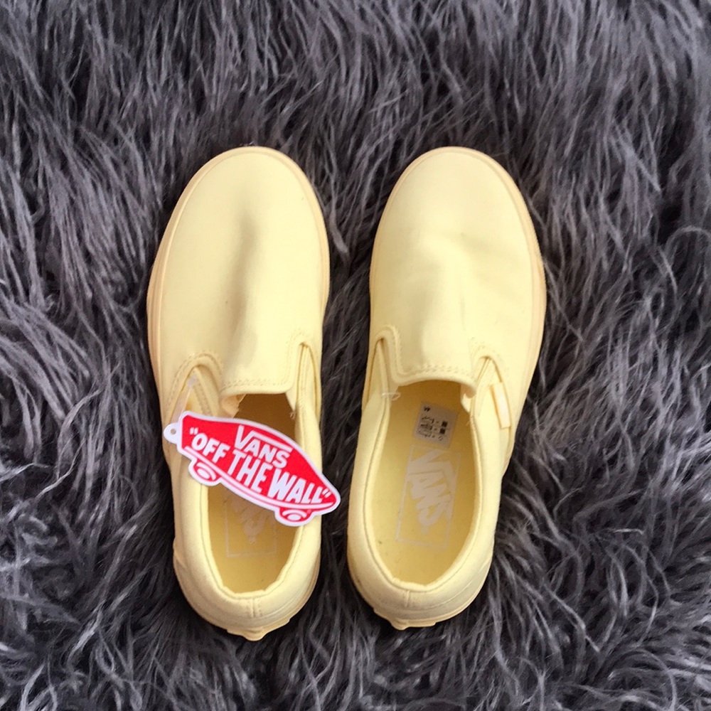Vans yellow slip ons